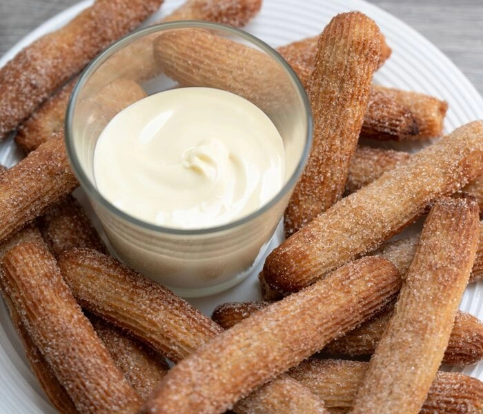 churros de vainilla con chocolate blanco