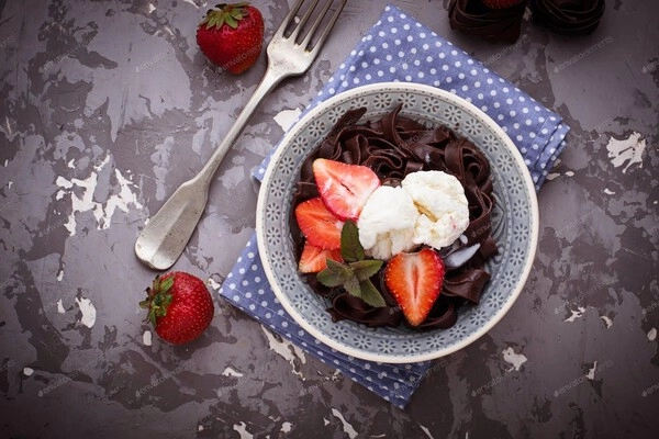 pasta de chocolate en fantasía de frutas